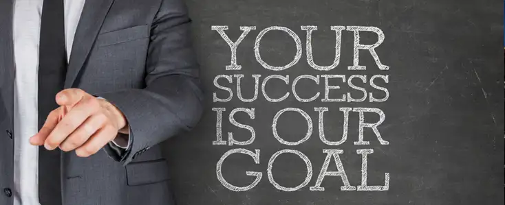Man in suit with - Your success is our goal - message